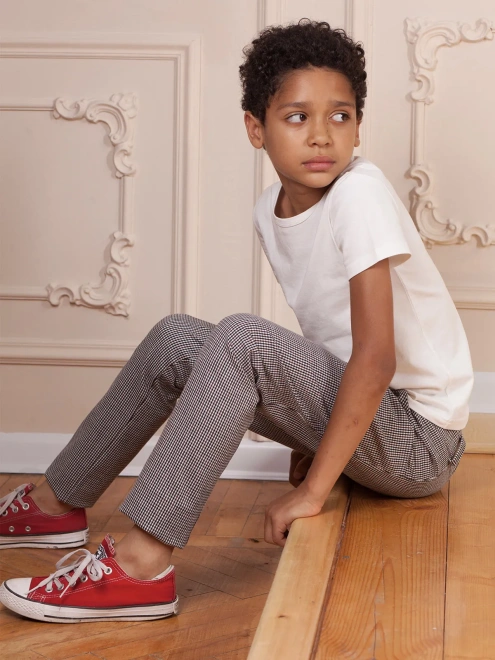 Брюки в гусиную лапку со смещенными боковыми швами 