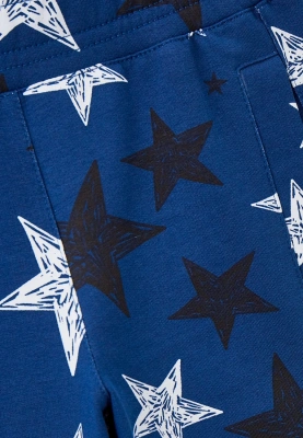 Брюки на широкой резинке на мальчика принт звезды на синем