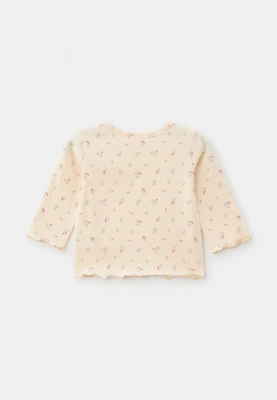 Комплект из брюк и блузки