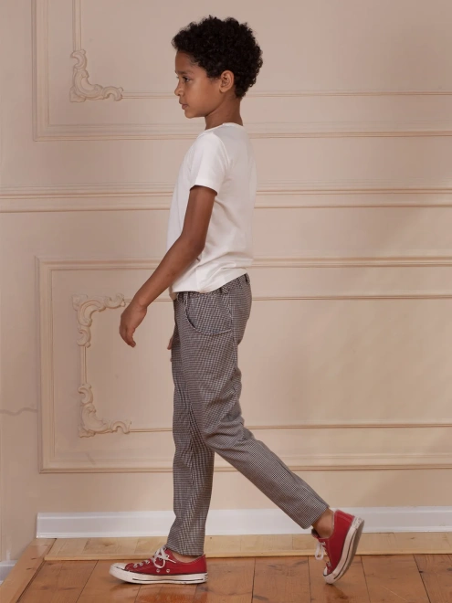 Брюки в гусиную лапку со смещенными боковыми швами 