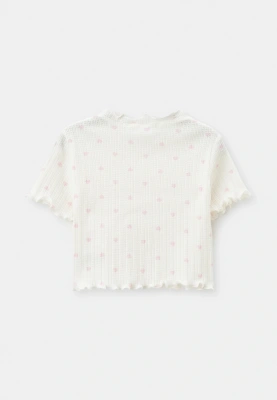 Комплект из футболки и брюк в белом цвете