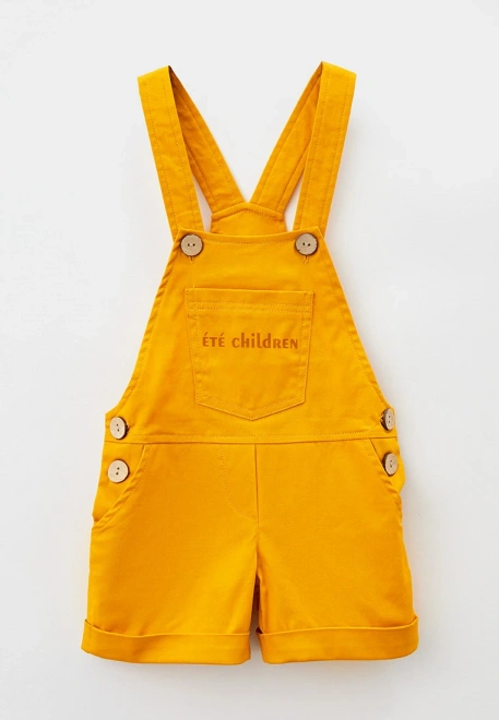 Комбинезон из хлопка горчичного цвета и лого 