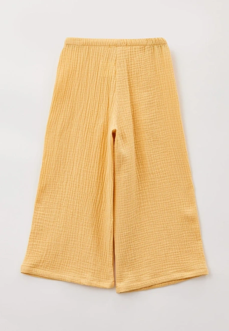 Брюки широкие из муслина бледно-желтого цвета