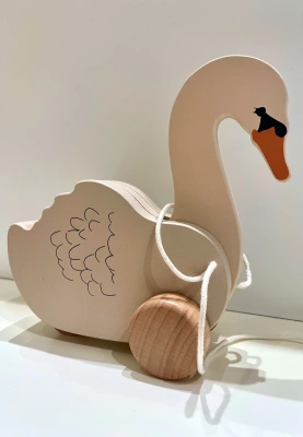 Игрушка лебедь на колесах и веревке