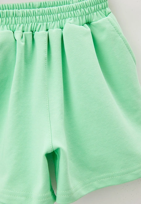 Шорты трикотажные из футера на резинке салатового цвета