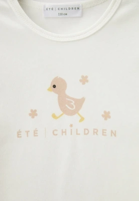 Пижама бежевого цвета с принтом для девочек