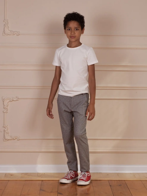 Брюки в гусиную лапку со смещенными боковыми швами 