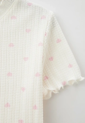 Комплект из футболки и брюк в белом цвете