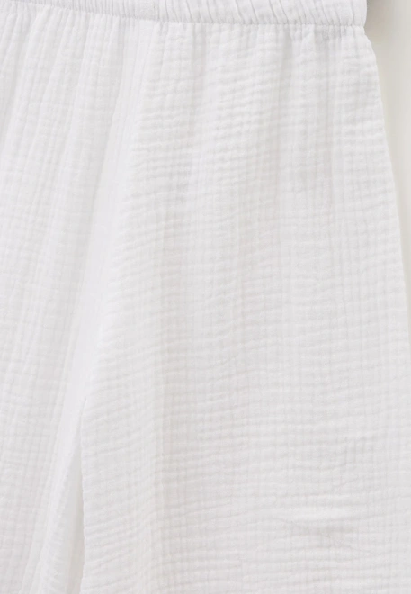 Брюки широкие из белого муслина 