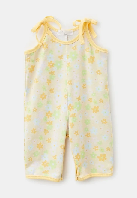Комбинезон из трикотажного хлопка в цветок с завязками и на кнопках 