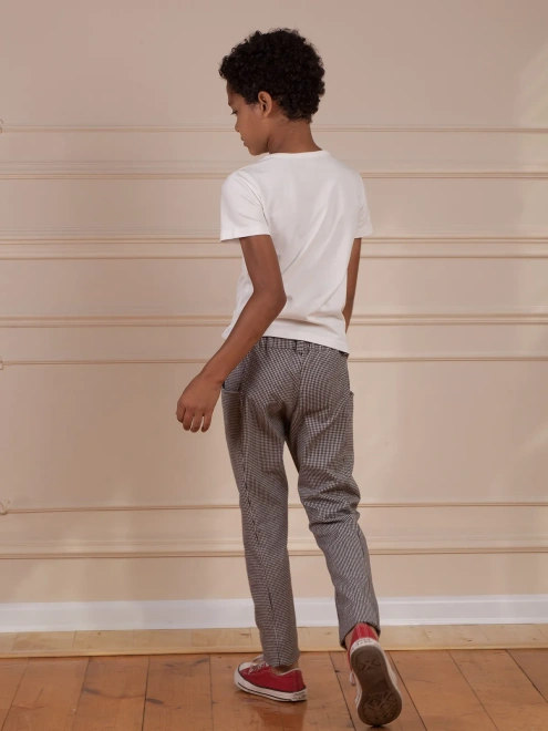 Брюки в гусиную лапку со смещенными боковыми швами 