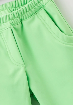 Брюки из водонепроницаемой ткани в салатовом цвете