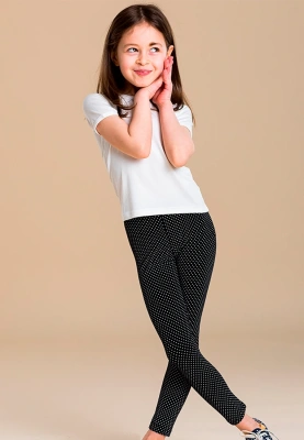 Леггинсы черного цвета в горошек