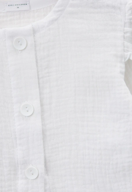 Блузка из белого муслина на пуговицах с крылышками на рукавах  Блузка из белого муслина на пуговицах с крылышками на рукавах