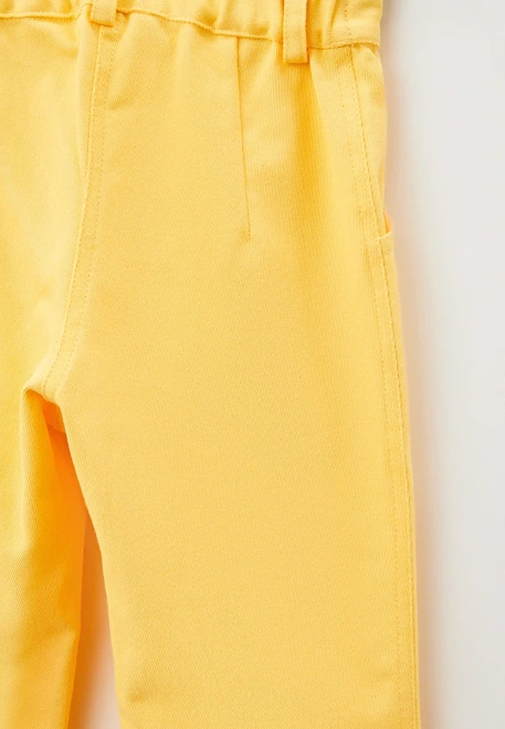 Брюки клеш из ярко-желтого денима