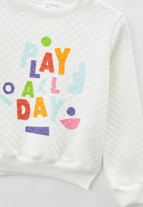 Свитшот молочного цвета с ярким принтом