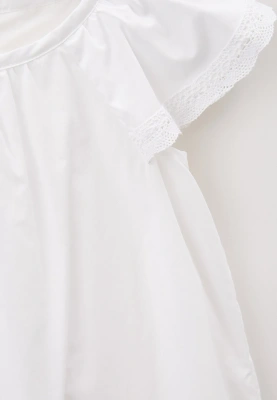 Платье из белого хлопка свободного кроя