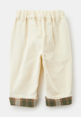 Брюки Букля из микровельвета в молочном цвете