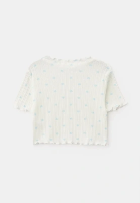 Комплект из футболки и брюк для девочек в белом цвете