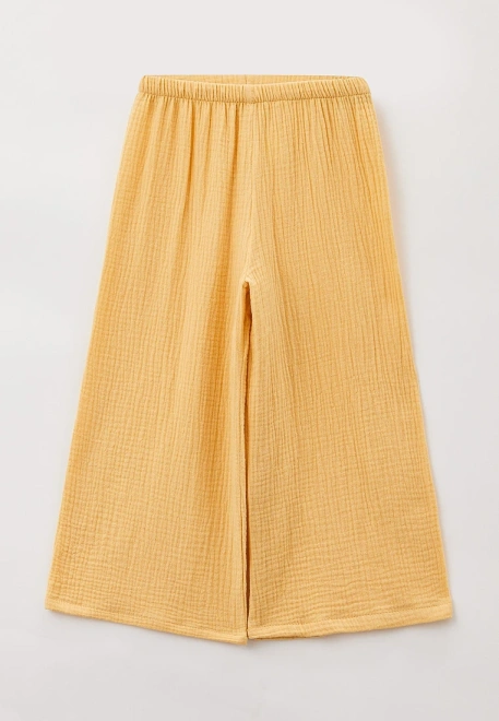 Брюки широкие из муслина бледно-желтого цвета