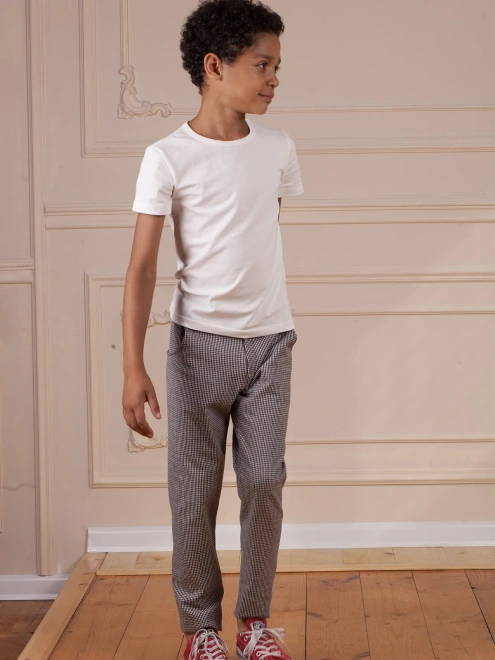 Брюки в гусиную лапку со смещенными боковыми швами 