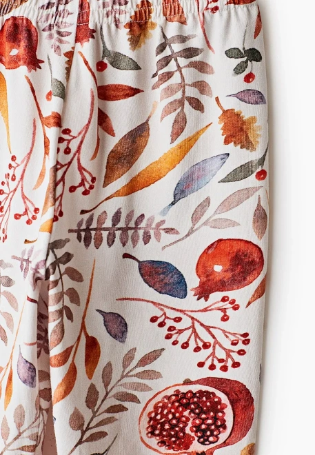 Леггинсы с гранатом и цветами в молочном окрасе