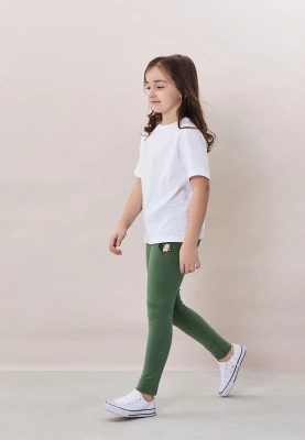 Леггинсы с цветком в зеленом цвете