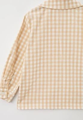 Блузка из теплого хлопка в клетку с круглым воротником и застежкой смещенной в бок 